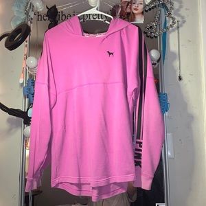 this brand is pink and it is size S but can fit a large